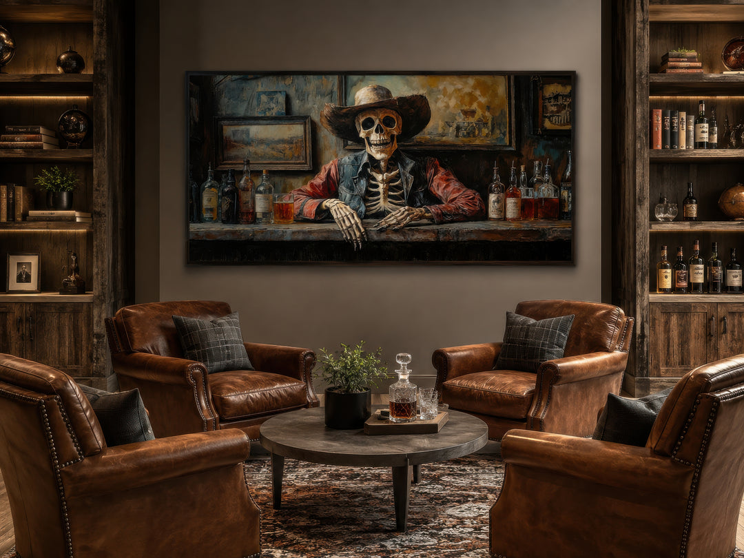 Skeleton cowboy barman framed canvas wall art in a rustic lounge with leather chairs.