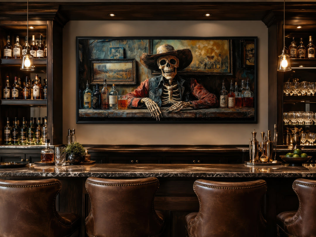 Framed canvas wall art of a skeleton cowboy bartender in a dimly lit Western saloon above a bar.