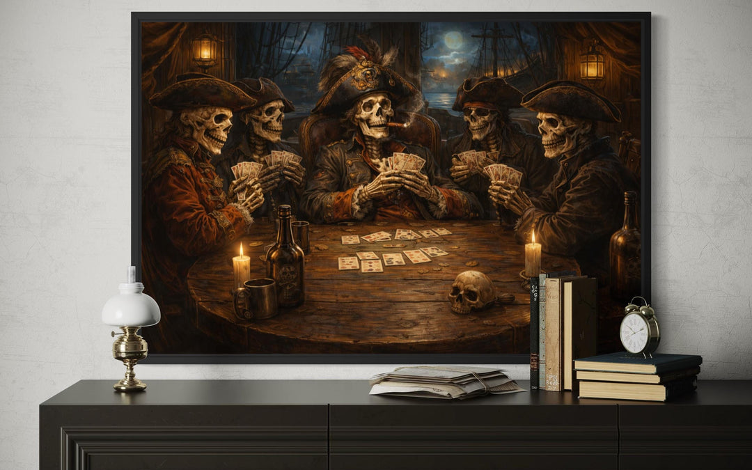 Framed wall art of skeleton pirates playing cards in a tavern, displayed above a dark wood dresser.
