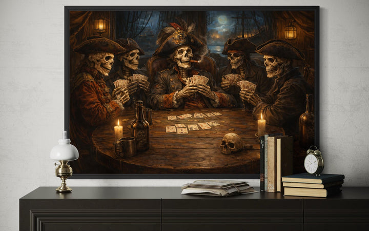 Framed wall art of skeleton pirates playing cards in a tavern, displayed above a dark wood dresser.