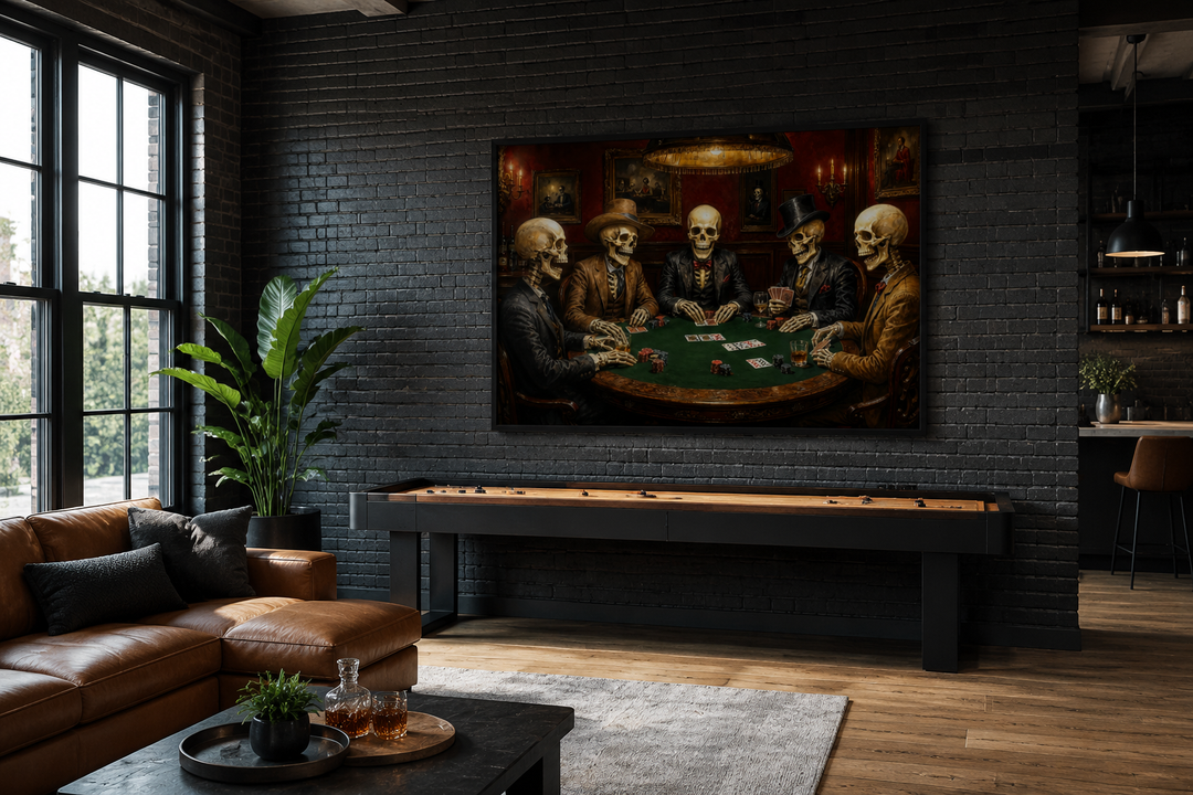 Gothic skeleton poker canvas wall art hanging in a dark, modern game room above a shuffleboard table.