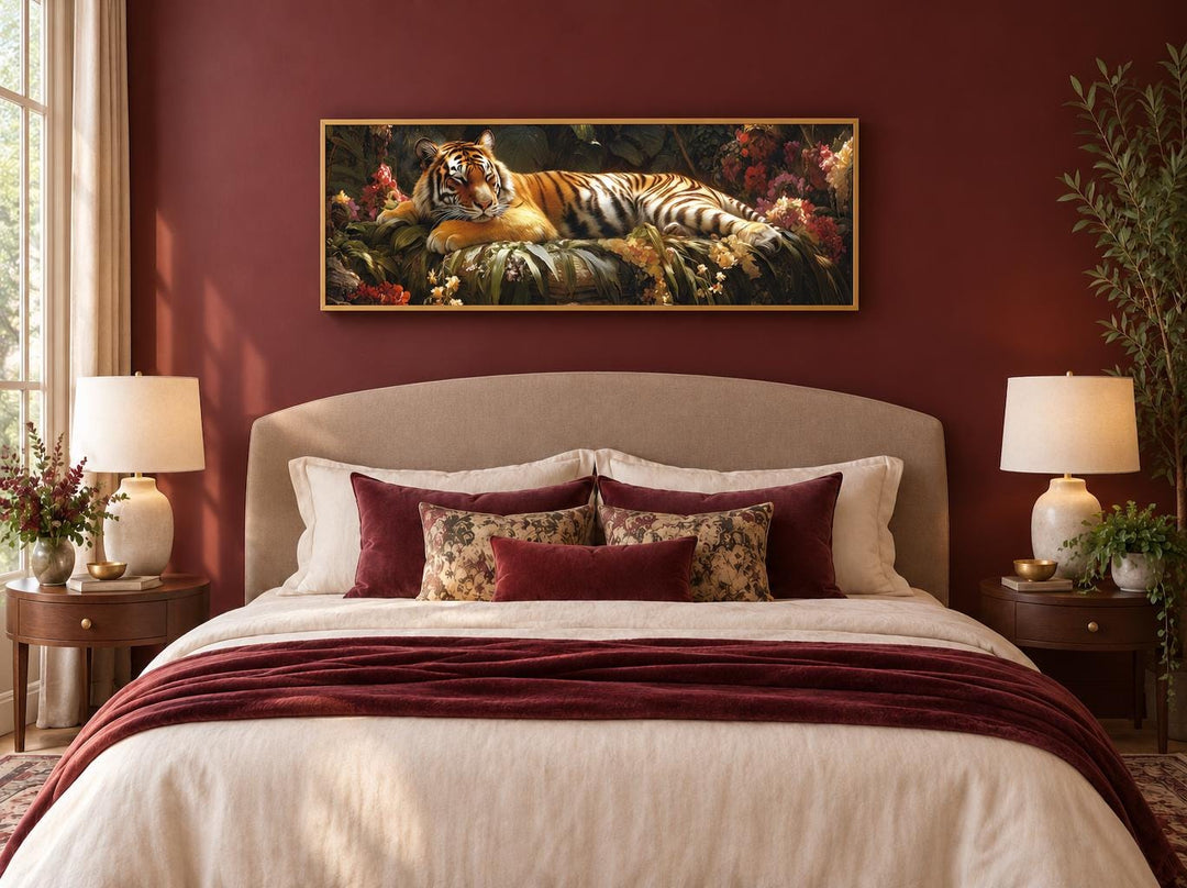 Sleeping Tiger long horizontal framed canvas wall art above a bed in a red bedroom.