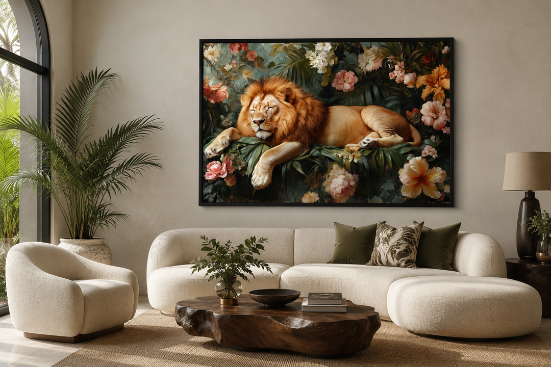 Framed canvas wall art of a lion sleeping among jungle flowers above a modern white sofa.