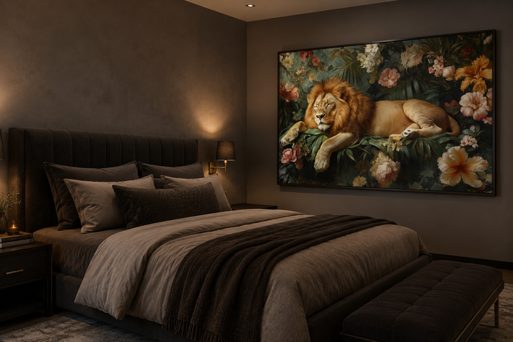 Framed canvas wall art of a lion sleeping in a floral jungle, hung above a bed in a dark bedroom.