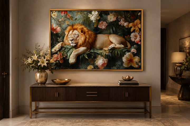 Framed canvas wall art of a lion sleeping among colorful flowers and jungle leaves above a console.