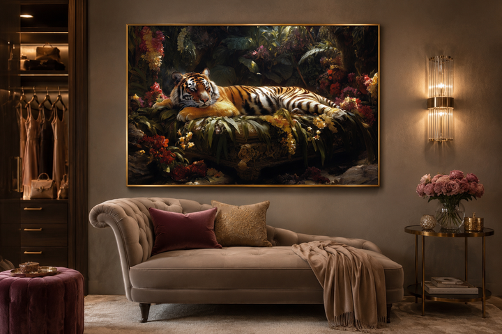 Framed canvas wall art of a tiger sleeping in a lush jungle, hanging above a beige chaise lounge.