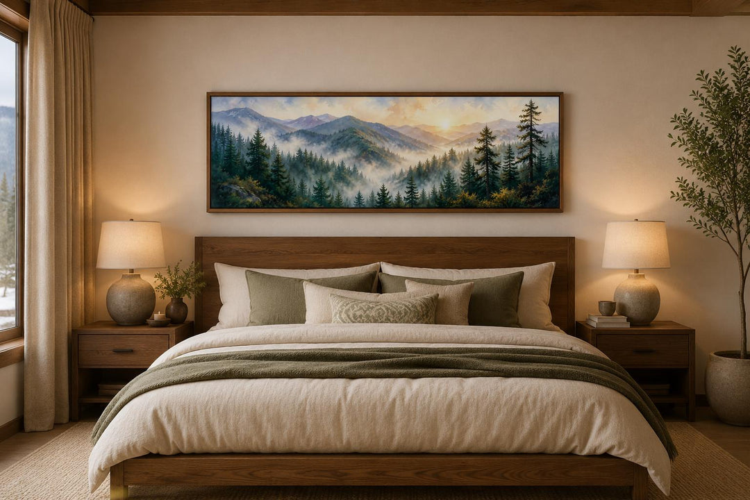 Smoky Mountains sunrise wall art in a panoramic frame above a bed in a rustic bedroom.