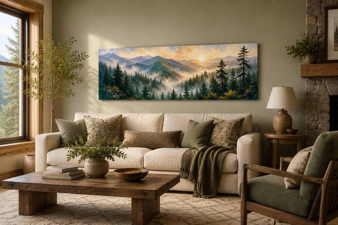 Panoramic Smoky Mountains sunrise canvas art above a beige couch in a rustic living room.