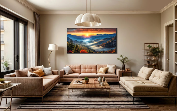 Smoky Mountains sunset canvas art hanging above a tan sofa in a modern rustic living room.