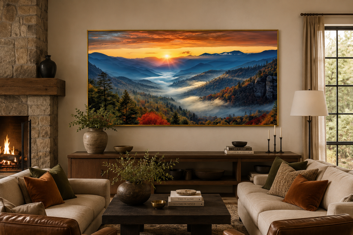 Smoky Mountains sunset canvas art hanging above a wooden console in a rustic living room.