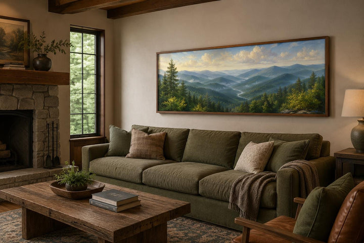 Panoramic Smoky Mountains canvas wall art above a green sofa in a rustic living room.