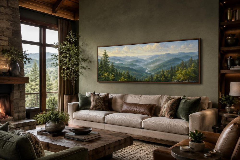 Panoramic Smoky Mountains canvas wall art above a sofa in a rustic cabin-style living room.