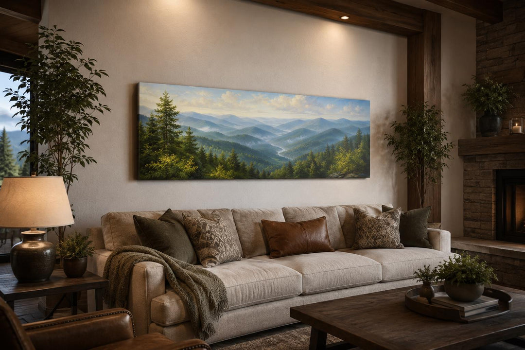 Panoramic Smoky Mountains canvas art showing misty blue ridges and green forests above a sofa.