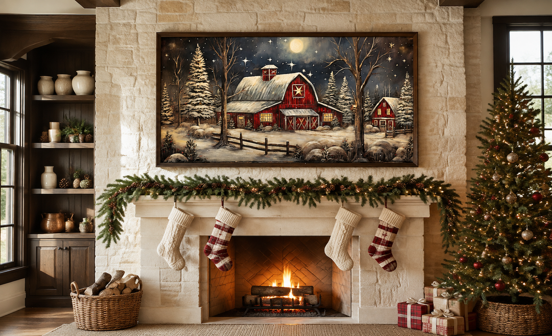 Snowy farm barn painting on wood framed canvas wall art hanging above a decorated fireplace mantel.
