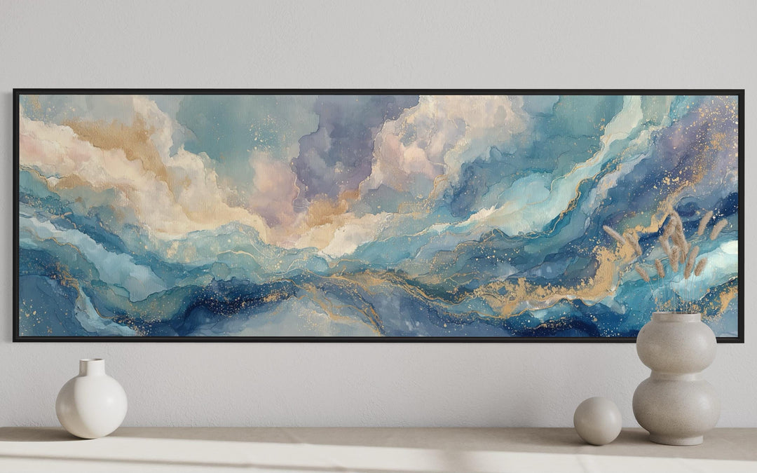 Long horizontal abstract wall art with soft blue, white, and gold marble-style textures.