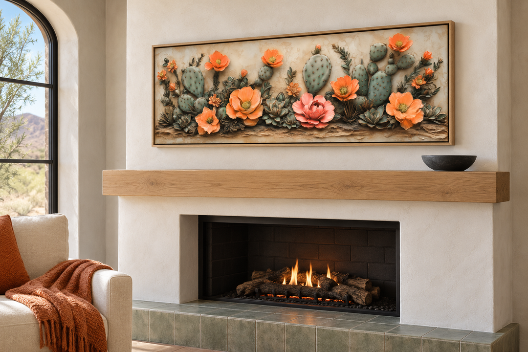 Southwest cactus wall art with orange blooms in a long narrow frame above a modern fireplace.