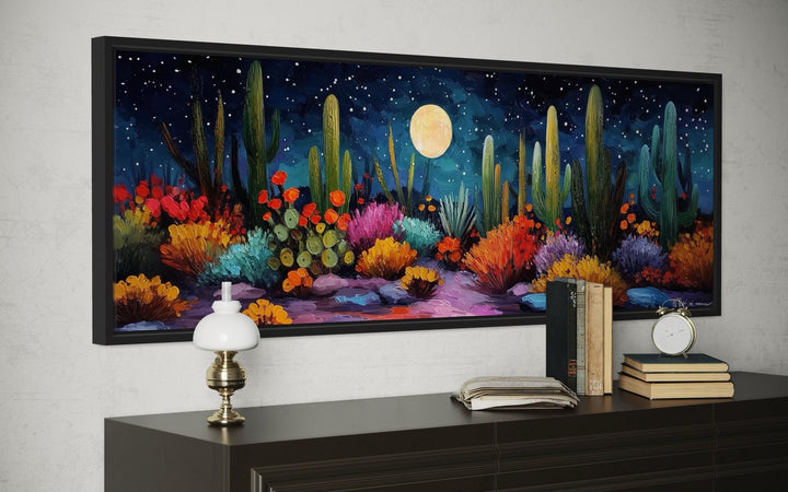 Southwest desert cacti wall art with a full moon and starry sky on a long horizontal canvas.