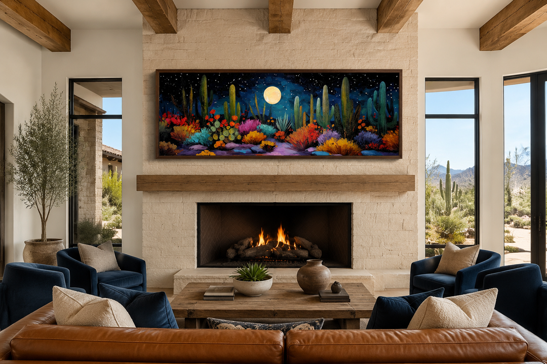 Southwest desert cacti under a moon and starry sky on a long horizontal canvas above a fireplace.