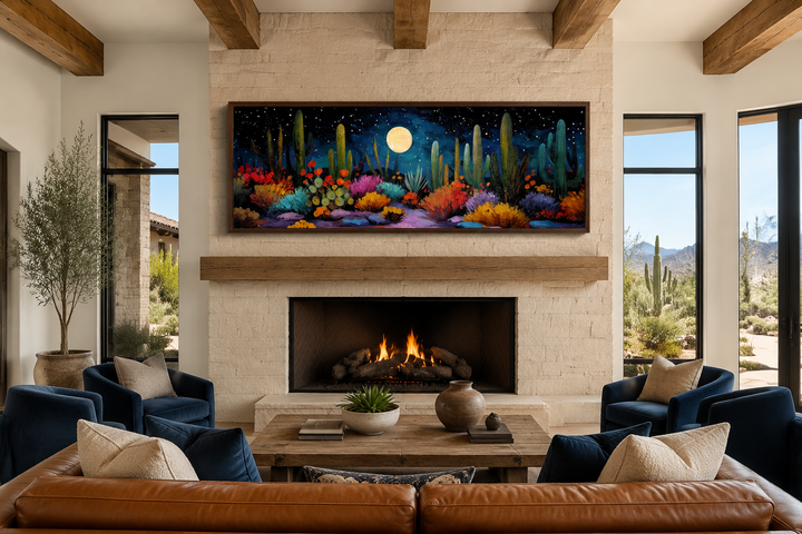 Southwest desert cacti under a moon and starry sky on a long horizontal canvas above a fireplace.