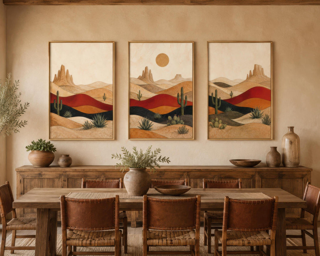 Set of 3 Southwest desert canvas prints with abstract cacti and mountains in a rustic dining room.