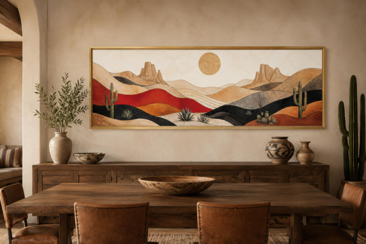 Southwest desert landscape wall art with cactus and golden sun in a mid-century modern dining room.