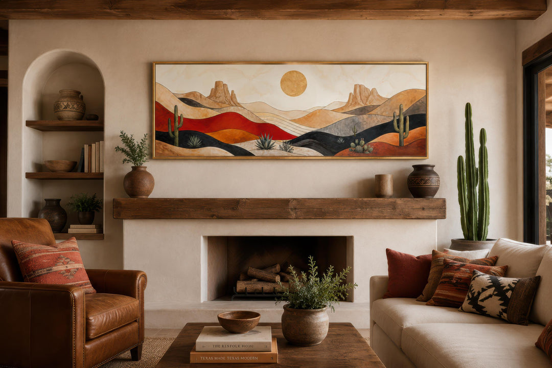 Southwest desert wall art with mid-century modern mountains, cactus, and golden sun over a fireplace.