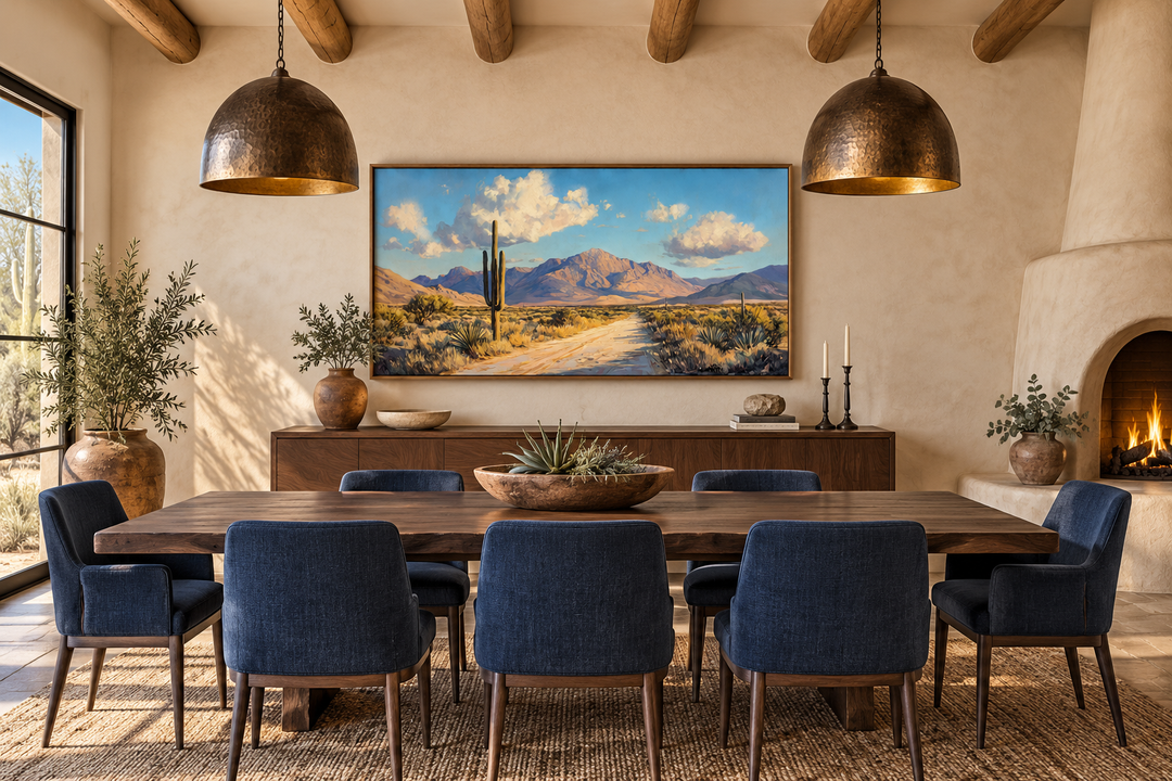 Southwestern desert landscape canvas wall art featuring a saguaro cactus and mountains over a table.