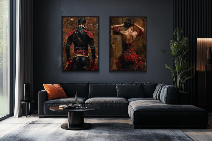 Set of 2 canvas prints featuring a matador and a flamenco dancer in red on a dark living room wall.