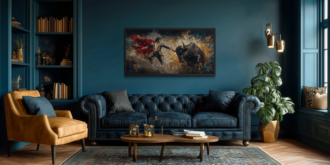 Spanish matador fighting a bull canvas wall art displayed in a dark blue living room.