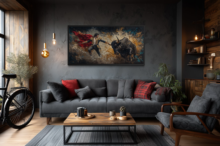 Spanish matador fighting bull canvas wall art displayed in a modern, dark-toned living room.