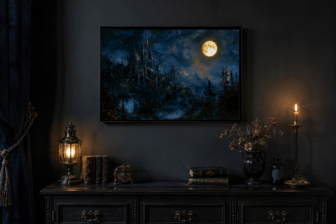 Framed navy blue wall art of a gothic haunted castle under a full moon in a dark room setting.