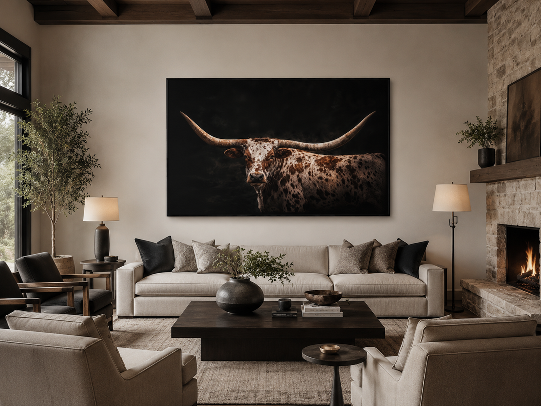 Spotted Texas Longhorn canvas wall art with floating frame in a rustic ranch living room.
