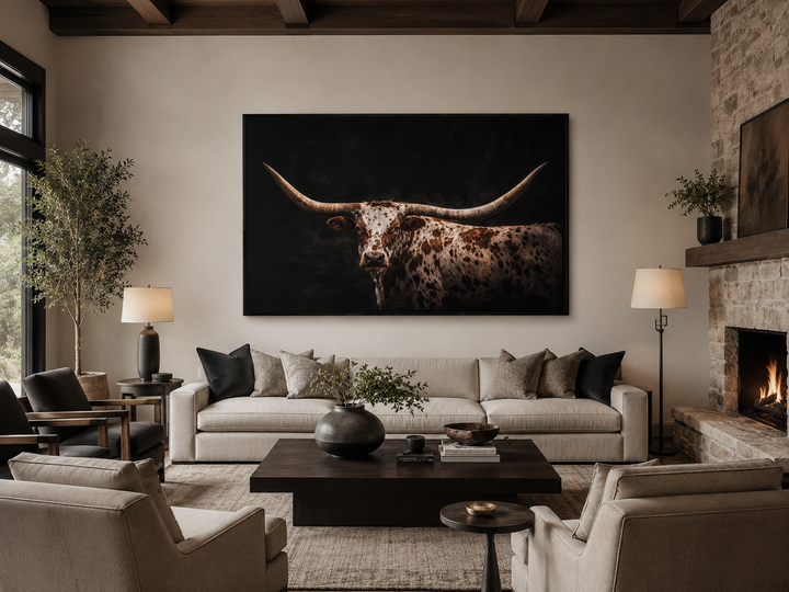 Spotted Texas Longhorn canvas wall art with floating frame in a rustic ranch living room.