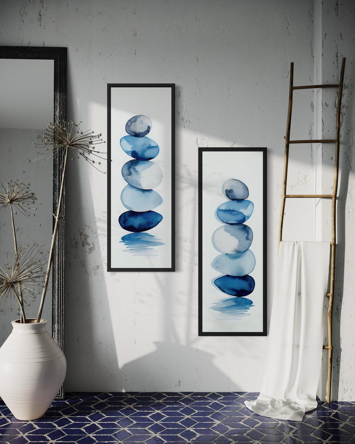 Two vertical canvases featuring blue watercolor stacked zen stones on a white background.