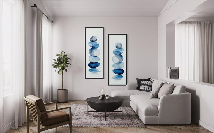 Stacked Zen Stones Blue Watercolor Set of 2 Canvas Wall Art in a modern living room setting.