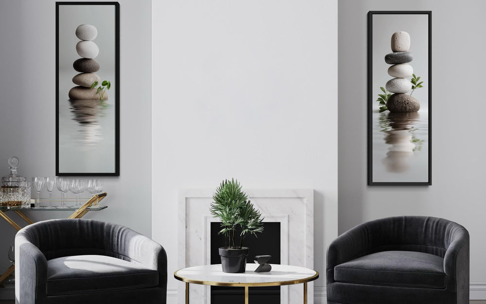 Set of two tall, narrow canvas prints featuring stacked zen stones over reflective water.