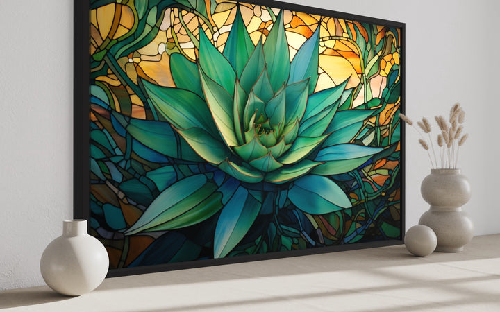 Stained glass style agave plant framed canvas wall art in a modern room with decorative vases.