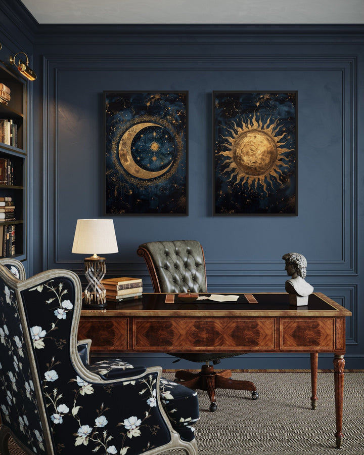 Sun and Moon set of 2 navy blue and gold framed canvas wall art in a dark blue office setting.