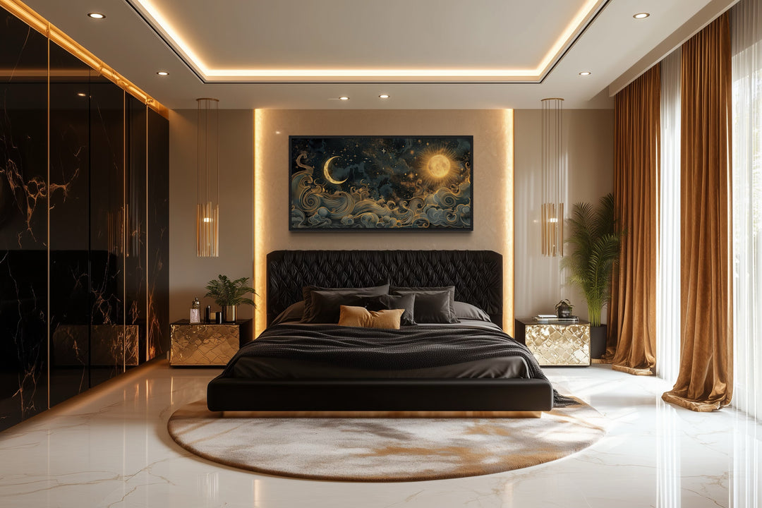 Framed black and gold celestial canvas wall art featuring a sun and moon above a modern bed.