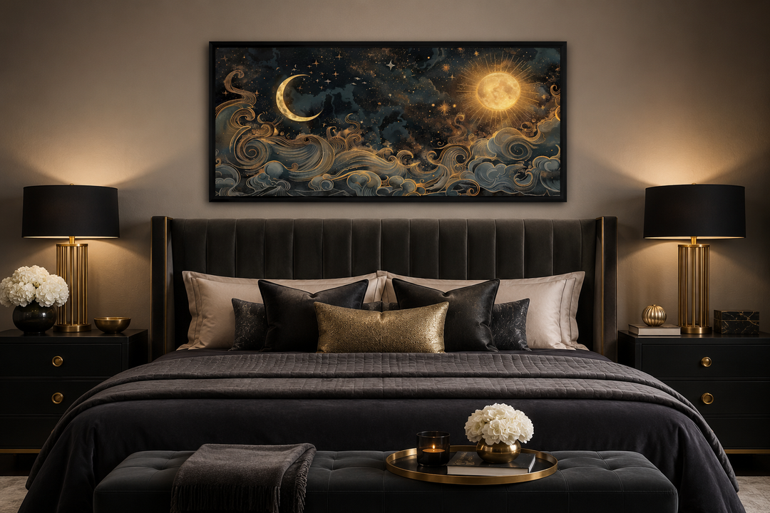 Framed black and gold celestial canvas art featuring a sun, moon, and stars above a dark bed.