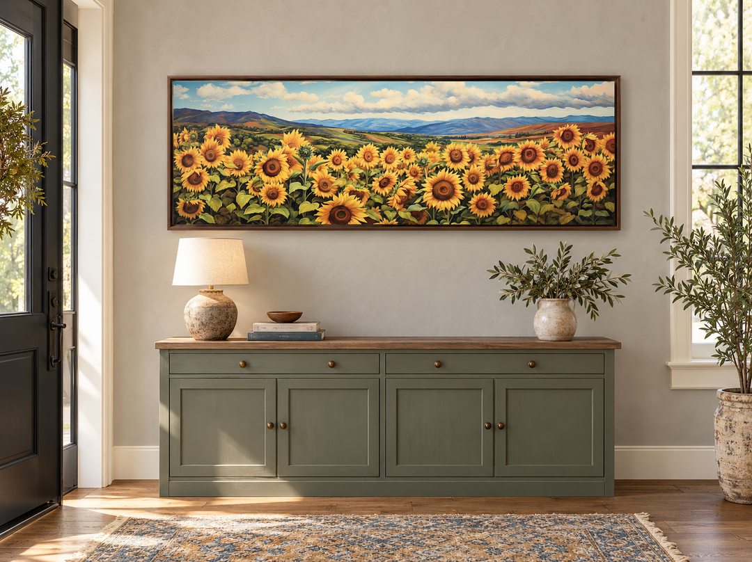 Sunflowers field rustic farmhouse long horizontal wall art in a brown frame above a green sideboard.