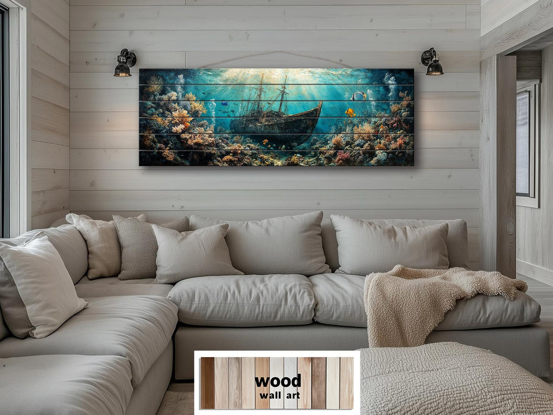 Sunken shipwreck wood wall art featuring a nautical scene above a neutral sectional sofa.