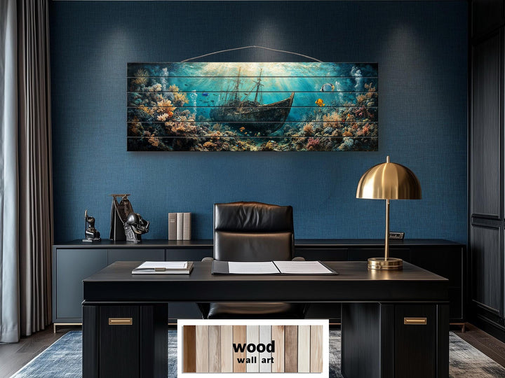 Sunken shipwreck scene printed on a horizontal distressed wood wall art piece in a modern office.
