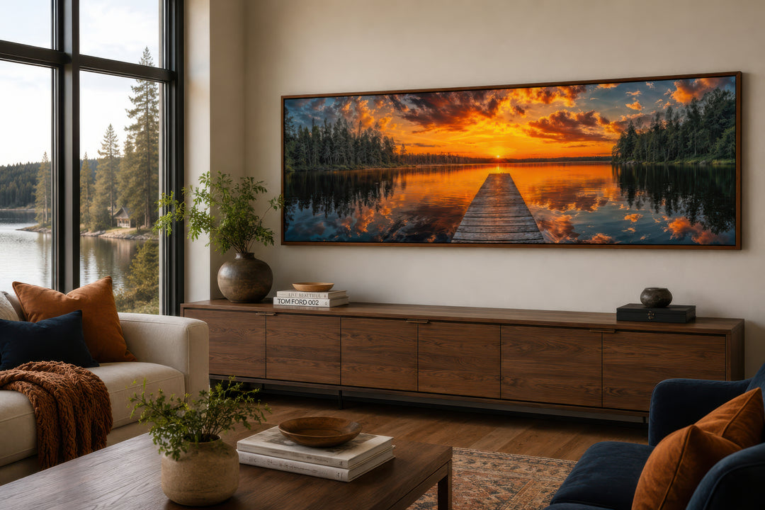 Sunrise over lake and fishing pier long horizontal canvas wall art in a modern living room.