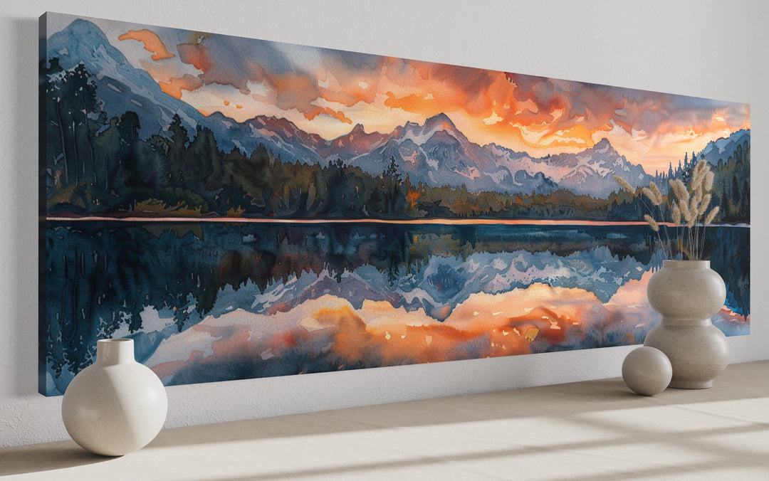 Panoramic watercolor canvas art of a sunset over a mountain lake, styled as above-bed decor.