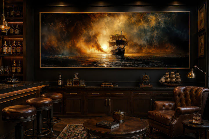 Sunset sailing ship horizontal canvas wall art in a dark, classic study with leather furniture.