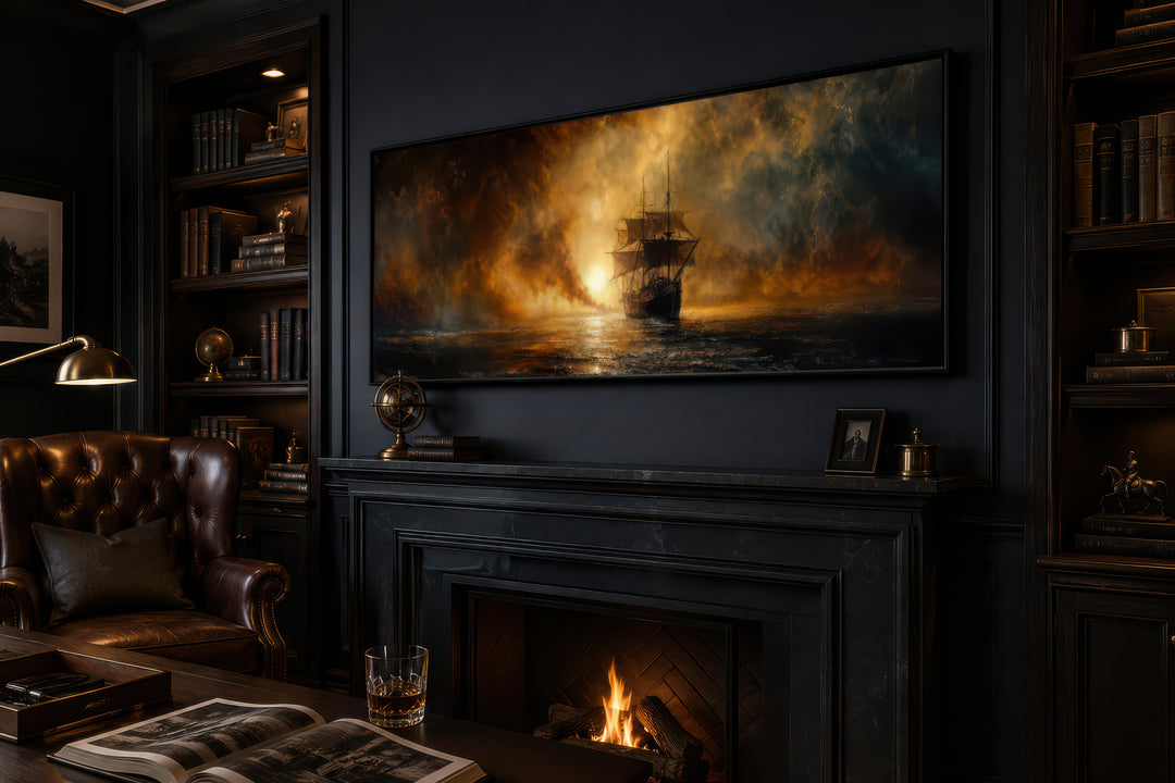 Sunset sailing ship long horizontal canvas wall art above a fireplace in a dark, classic room.