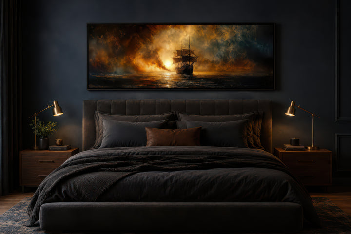 Sunset sailing ship long horizontal canvas wall art above a bed in a dark, modern bedroom.