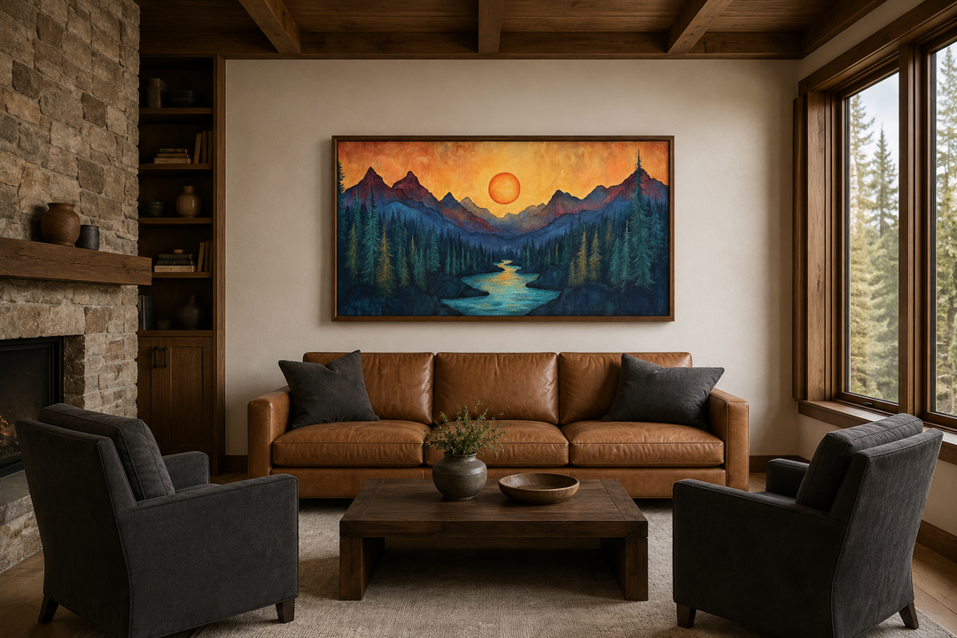 Sunset Mountain River landscape canvas wall art print above a leather sofa in a rustic living room.