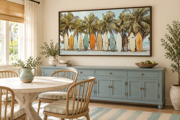 Surfboards On The Beach Framed Canvas Wall Art above a blue sideboard in a coastal dining room.